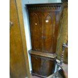 Mahogany 4 door corner cupboard with writing pull out and oval molding