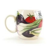 Moorcroft Grow your own mug designed by Kerry Goodwin.