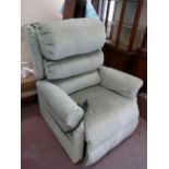 Repose branded large electric armchair, in diamond cut green upholstery.