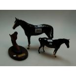 A Beswick Red Rum plaque Model 2702 together with a Royal doulton brown horse and one other (3)