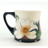 Moorcroft Floral design trail mug dated 4/4/16.