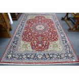 Fine persian rug with all over floral decoration, blue bordered 300x200