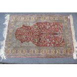 Old prayer mat with decoration of a tree with birds in a red field 130x88