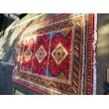 Large modern geometric rug having 3 central medallions in rectangular panels 375cm x 279cm