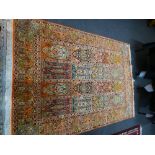 Modern rug having 16 rectangular panels with tree lined border 224cm x 159cm