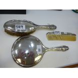 Silver backed hand mirror with matching hairbrush and comb