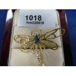 Yellow coloured metal dragonfly brooch inset diamond chip eyes and aquamarine body, unmarked, 4.