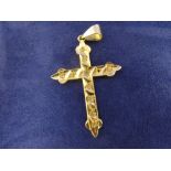 Yellow coloured metal cross pendant, bright cut and inset with diamonds, one missing approx gross