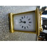 Old brass carriage clock