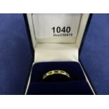 Lady's 9ct yellow gold ring set with 4 small diamonds and 5 emeralds, stamped 275, size M, approx