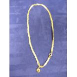 18ct yellow gold neckchain with small 18ct yellow gold heart pendant, both stamped 750 approx 11.4g