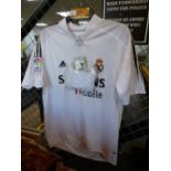 A Luis Figo Real Madrid signed football shirt with certificate