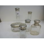 Set of 6 Edwardian cut glass toilet jars with silver caps engraved with initials EAS hallmarked