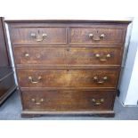 An antique oak ch having two short and three long drawers, 97cm