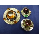 Large Scottish white coloured metal cairngorm brooch set with amber coloured stones, 7cm Diameter,