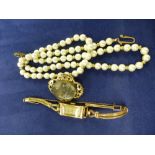 Victorian mourning brooch, yellow coloured metal ladys wristwatch and a simulated pearl neclklace