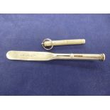 Sterling silver retractable pen/pencil in the form of a paddle, stamped S. Mordan & Co sterling