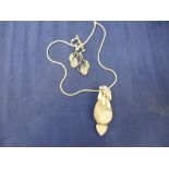 Modern silver necklace inset with large rose quartz and mother of pearl together with a pair of