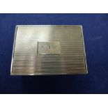 Silver matchbox case with engine turned decoration & initials A.J.K. London 1957