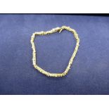 14K yellow gold bracelet inset baguette cut stones 14K approx