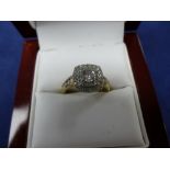 18K Diamond ring on an 18K yellow gold shank inset with diamonds to the shoulders size M stamped 18K