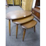 A n of Ercol pebble coffee tables