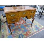 Reproduction burr walnut low boy with five drawers on cabriole legs