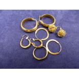 Small collection of 9ct yellow gold earrings including hoop earrings and ear studs approx. 9g