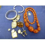 Silver hinged bangle, amber style bead necklace, silver elephant brooch etc.