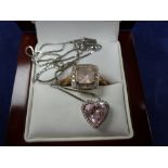 Modern 9ct white gold heart pendant inset with pink and white coloured stones stamped 9K, on a 9ct