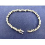 10K white gold and diamond bracelet stamped 10k, 18.5cm, long