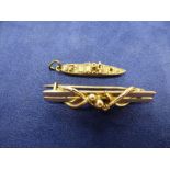 9ct rose gold bar brooch stamped 9ct and a 9ct yellow gold ship charm stamped 375, 5.6g