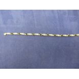 9ct yellow gold bracelet inset with Sapphires and diamonds, stamped 375 approx 19cm long