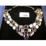 Modern silver necklace inset with large amethysts and mother of pearl