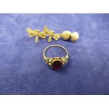 Yellow coloured metal ring set with garnet and seed pearls, size M/N, pair of 9ct yellow gold