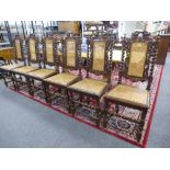 Set of 6 carved oak dining chairs with barley twist supports with cane seats