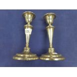 Pair of Edwardian silver candlicks with plain columns, reeded decoration, Birmingham 1906 approx