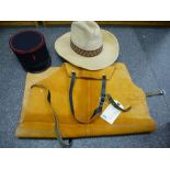 Suede blacksmith's apron, Beco stetson, and a French Gendarme cap