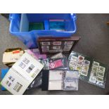 A Quantity of stamp albums containing mainly 1980's G.B stamps a small album of postcards mainly