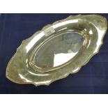 Plain silver boat shaped dish with a shaped, beaded edge, London 1925, Makers Mark E.J.G for Ellis