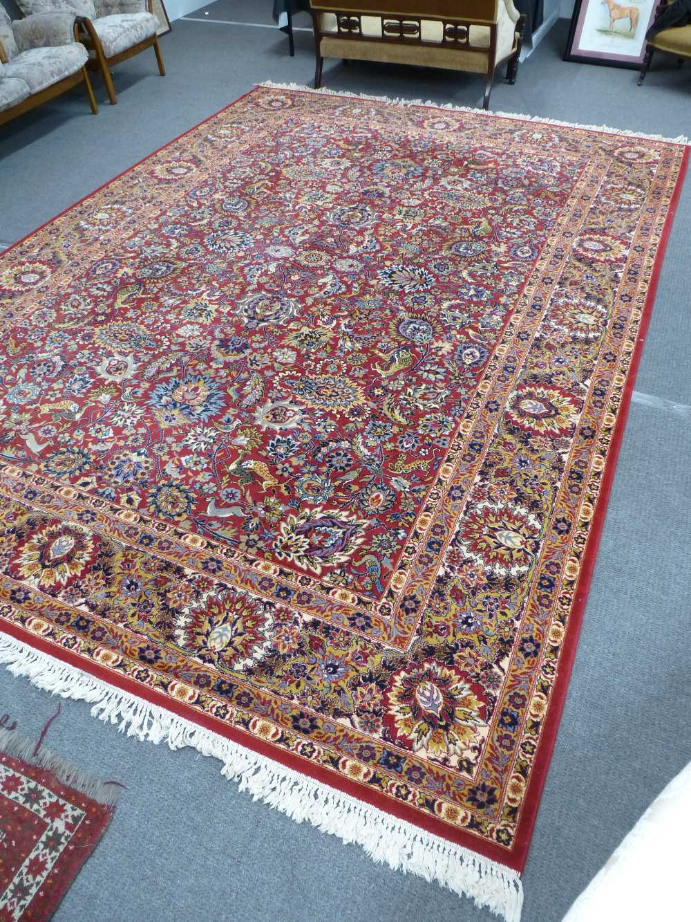 A Belgium super Keshan Persian style carpet with floral decoration 414x299cms
