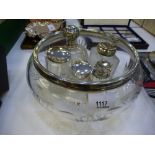 Collection of glass toilet jars some with silver lids and a glass fruit bowel with silver rim