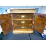 19th C burr walnut veneered specimen ch fitted 3 drawers and 2 doors, 28cm wide