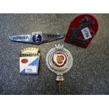 Four vintage car badges including Sunbeam Rapier