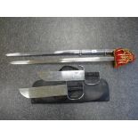 Dress sword with steel scabbard and a pair of Wing Chung swords