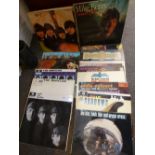 A small quantity of LPs to include seven Beatles examples