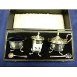 Silver 3 piece cruet set, Birmingham 1948, one blue glass liner replaced, silver salt spoon and a