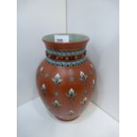 Mettlach stoneware vase with stylised flower and leaf design, impressed, mark, 1875, 23cm high