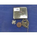 A plated cigarette case, having R.A.F. badge, a silver medal decorated penny farthing and sundry