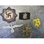 Kriegsmarine German cloth issue Cross with gilded wreath, 1941, together with other German badges,